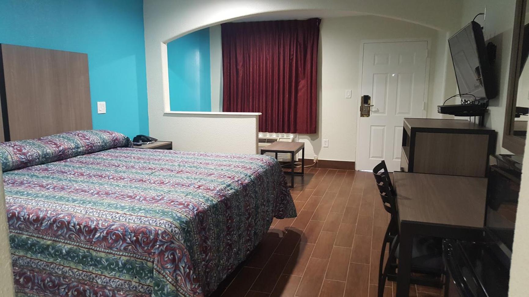 Moonlight Inn & Suites Jersey Village Quarto foto